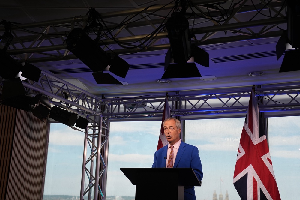 Reform UK leader Nigel Farage makes a statement to the media at the party headquarters in Millbank, central London. Mr Farage has resigned as MP for Clacton, saying he will fight the forthcoming by-election (PA)