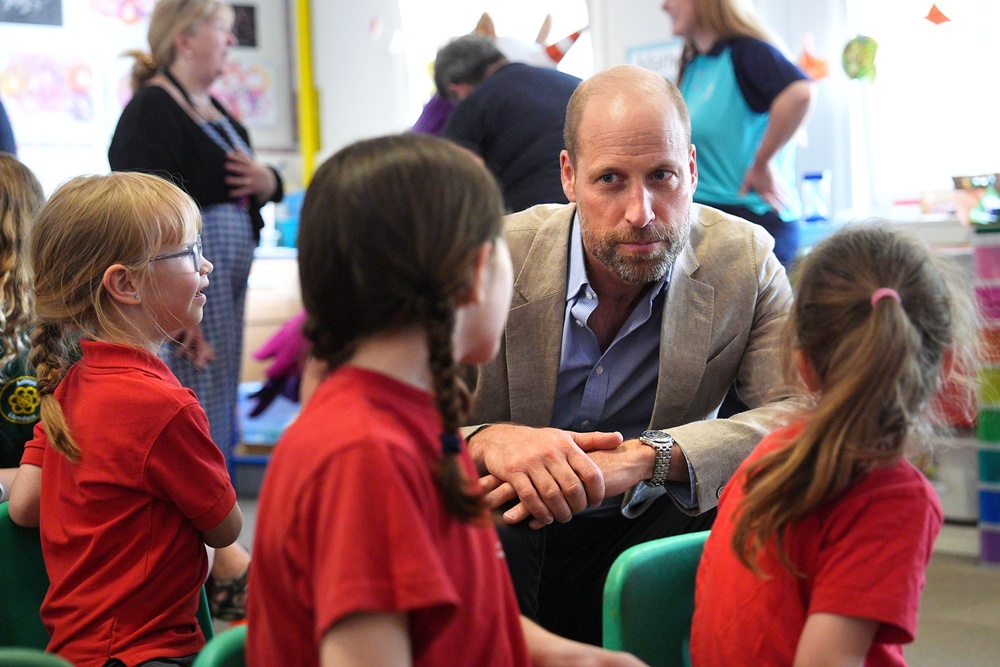 The Prince of Wales meets pupils who were learning about the Commonwealth Games (Aaron Chown/PA) (PA Wire)