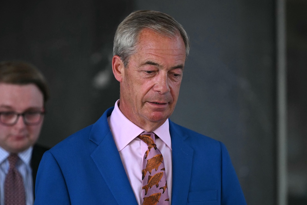 Reform UK Leader Nigel Farage leaves Millbank Tower after making a televised speech in which he resigned as MP for Clacton (AFP/Getty)