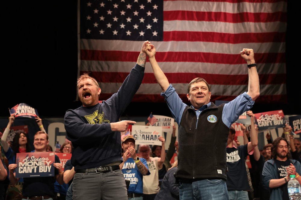 Platner and Troy Jackson (R), who is running for Governor of Maine, stand together during a “Fighting Oligarchy” tour stop at the Collins Center for the Arts on the University of Maine campus on May 24, 2026, in Orono, Maine (Getty)