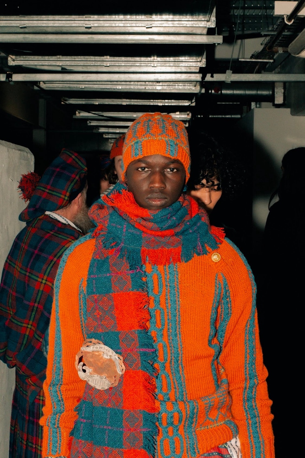 Look from Incentive shown at LFW; Fishermans jumper and hat hand knitted in British wool with diamond net wool scarf handwoven in Scotland and adorned with BH243 crab brooch handmade in Scotland. (Edward Jivan West)