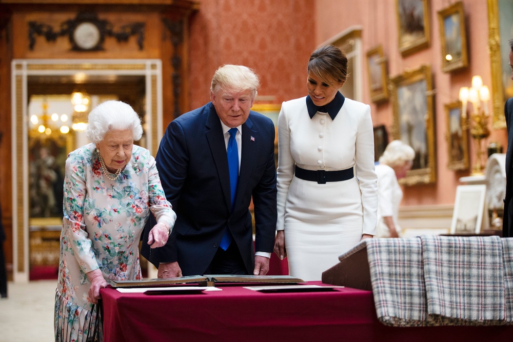 US president Donald Trump and First Lady Melania Trump view a special exhibition with Queen Elizabeth II in the then-pink Picture Gallery during the 2019 state visit (Tolga Akmen/PA) (PA Archive)