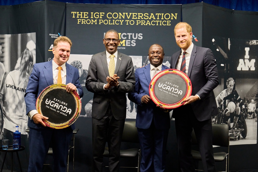 Duke of Sussex (right) founding patron of the Invictus Games Foundation and Rob Owen Chief Executive Officer of the Invictus Games Foundation (left), present a commemorative plaque to Kiryowa Kiwanuka, Uganda's Minister of Defence and Veterans Affairs (second left), to mark Uganda's formal welcome as the 26th nation to join the Invictus Community of Nations (PA)