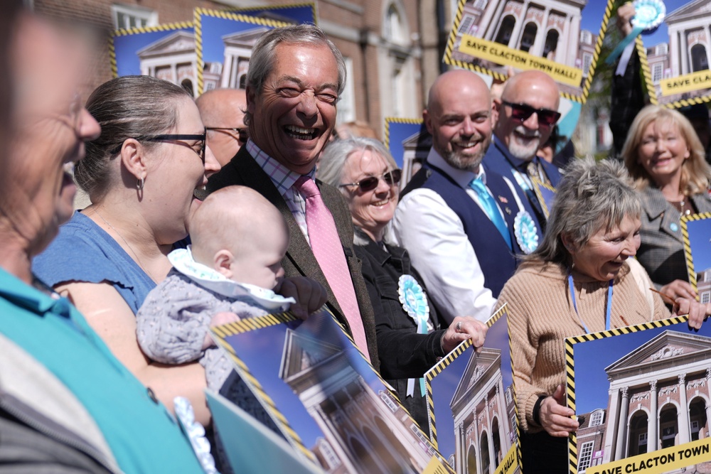 Reform UK leader Nigel Farage meets supporters during a walkabout in Clacton-on-Sea, Essex (Stefan Rousseau/PA) (PA Wire)
