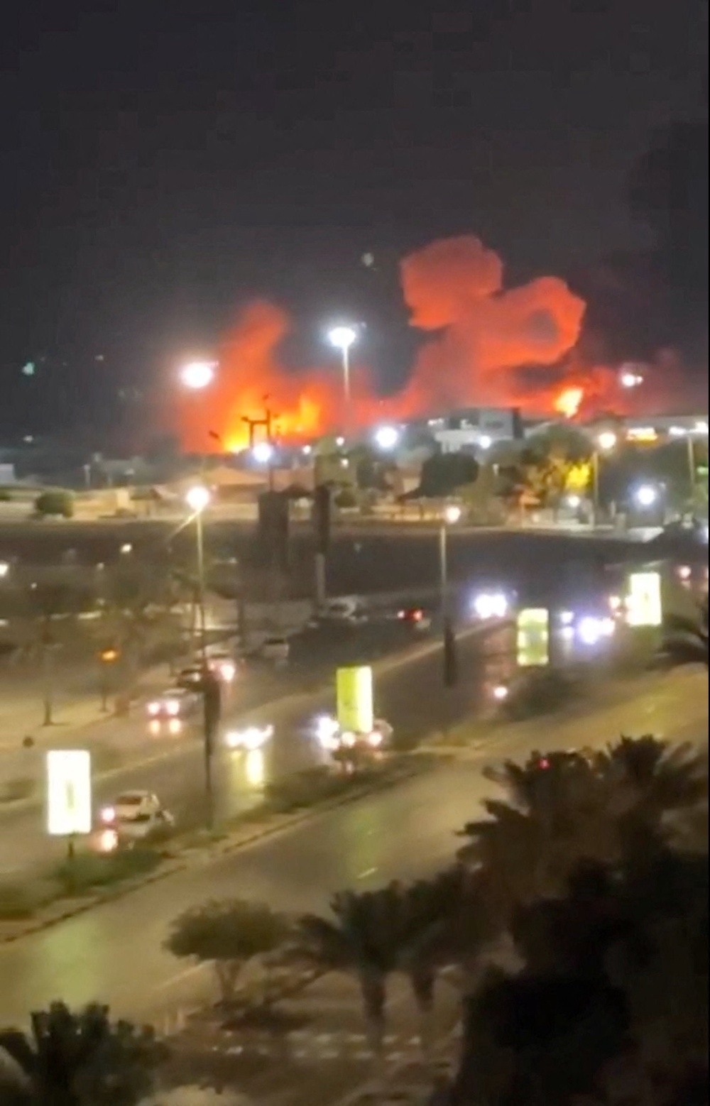 Smoke and flames rise after an explosion in Bandar Abbas (Reuters)