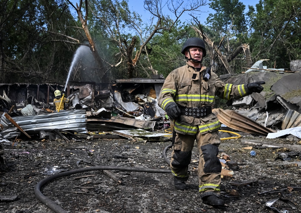 Rescuers work at a site of a Russian air strike, amid Russia's attack on Ukraine, in Zaporizhzhia, Ukraine July 8, 2026. (Reuters)