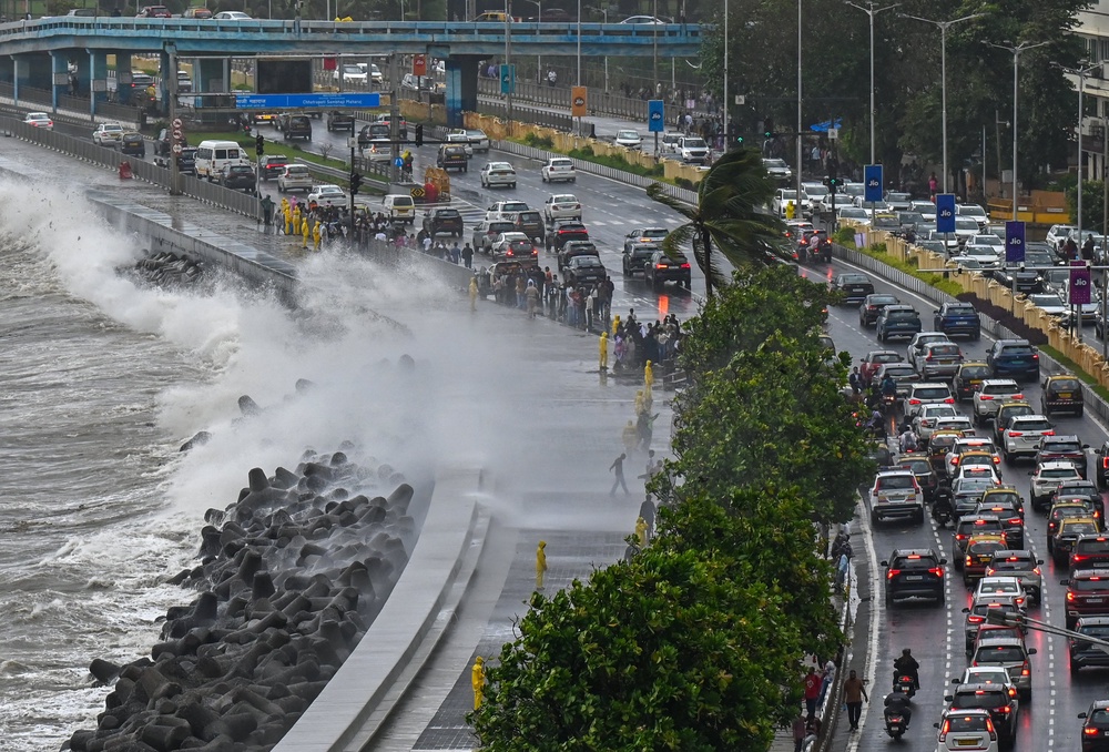 Waves crash against the seafront during monsoon rains in Mumbai (AFP/Getty)