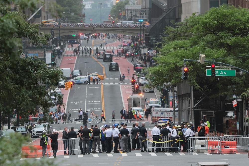 Authorities have partially or fully evacuated five buildings, and traffic has been blocked off from accessing a perimeter spanning multiple blocks. Police barricades are pictured in the area on Tuesday (Getty Images)