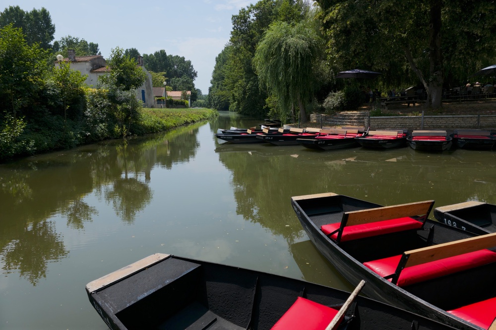 The flat-bottomed boats are used to travel between villages (Anna Richards)