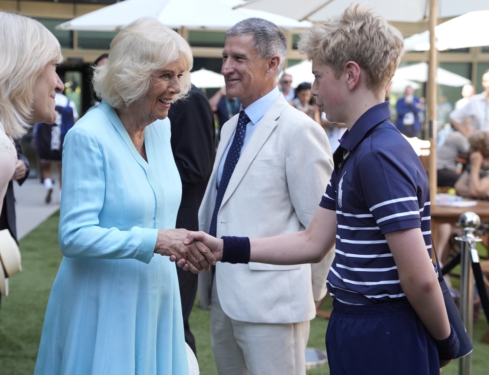 Camilla also spoke to ball boy Zebedee, from Saint Cecilia’s Church of England School in Southfields, south-west London (Andrew Matthews/PA) (PA Wire)