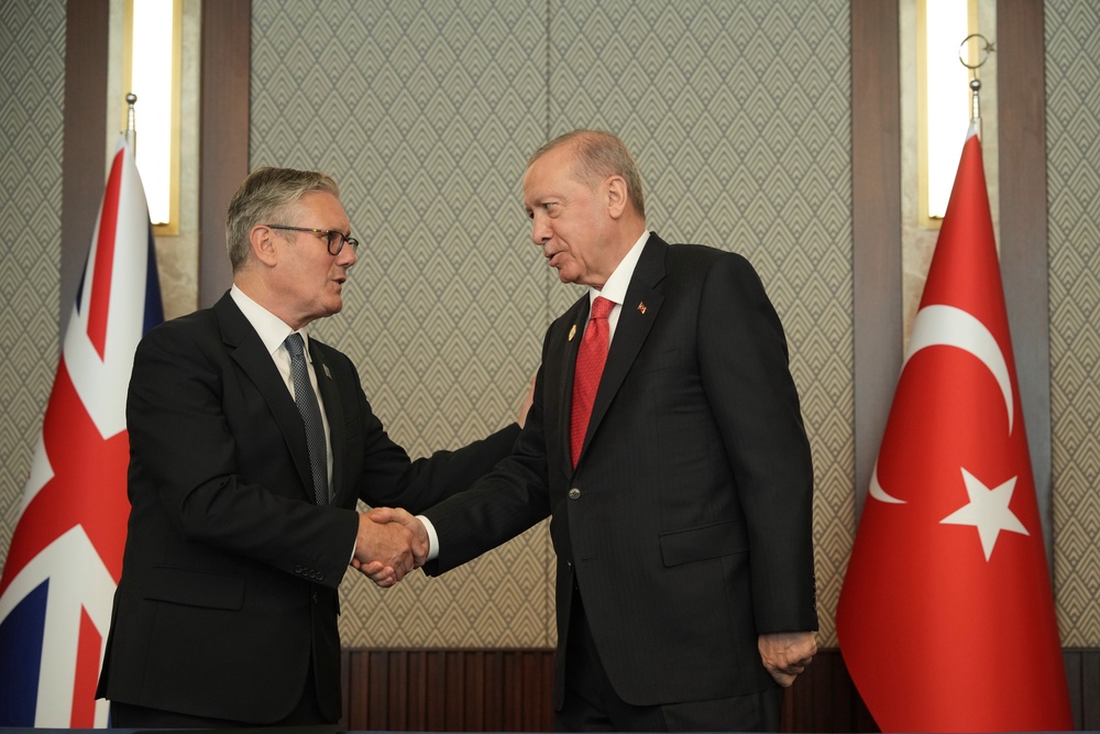 Prime Minister Sir Keir Starmer and President Recep Tayyip Erdogan shake hands after signing a defence partnership agreement (Alastair Grant/PA) (PA Wire)