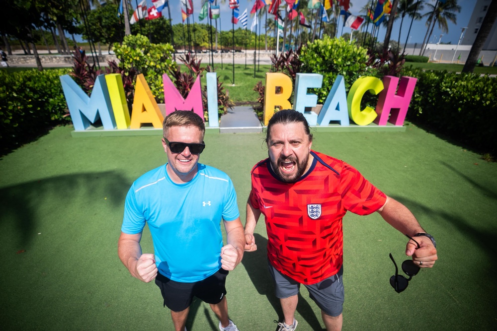 England fans Ben Shaw, 33, (left) and Spencer Starkes, 42, pose on South Beach in Miami (James Manning/PA) (PA Wire)