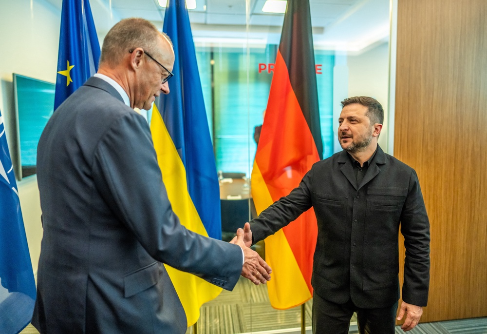 German Chancellor Friedrich Merz (L) shake hands with Ukraine's President Volodymyr Zelensky on the sidelines of the 36th NATO Heads of State and Government Summit in Ankara, on July 7, 2026. (Photo by Michael Kappeler / POOL / AFP via Getty Images) (AFP/Getty)