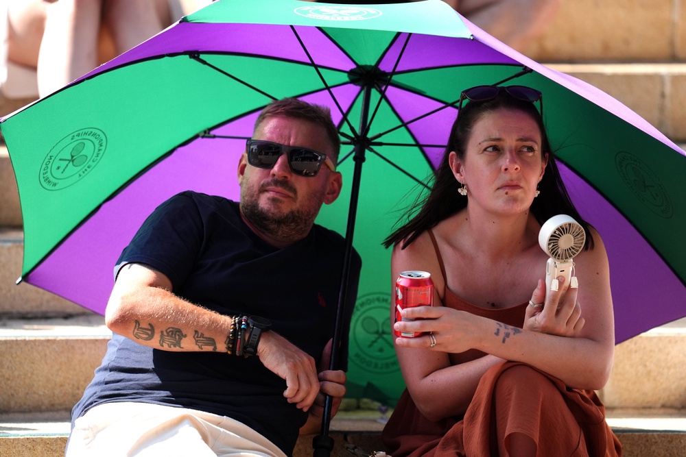 Spectators on The Hill as they watch the Gentlemen’s Singles quarter-final match between Arthur Fery of Great Britain and Flavio Cobolli of Italy on day ten of the 2026 Wimbledon Championships (Adam Davy/PA) (PA Wire)