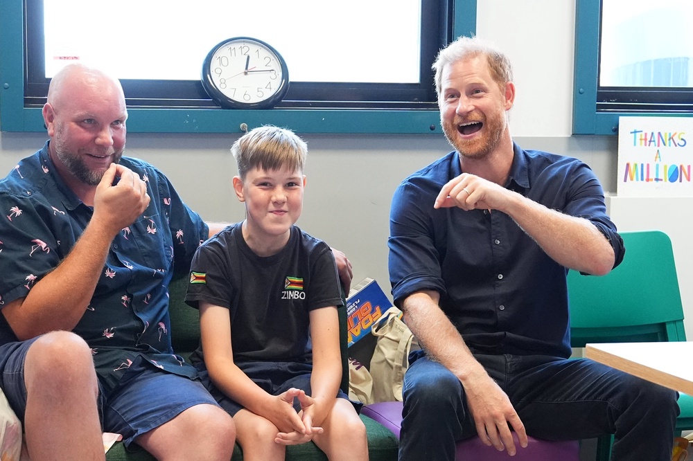 Harry with Wyatt Makwana, 12 (Aaron Chown/PA) (PA Wire)