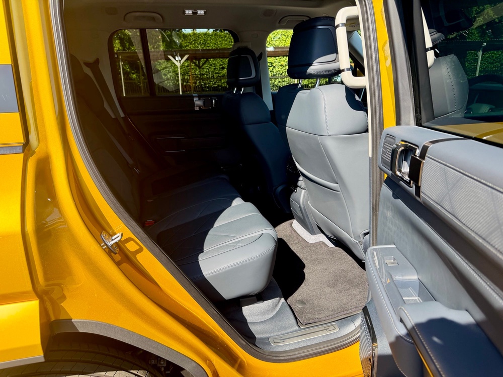 There's plenty of room for three in the back seats of the Denza Bao 5, helped by a usefully flat floor (Steve Fowler)