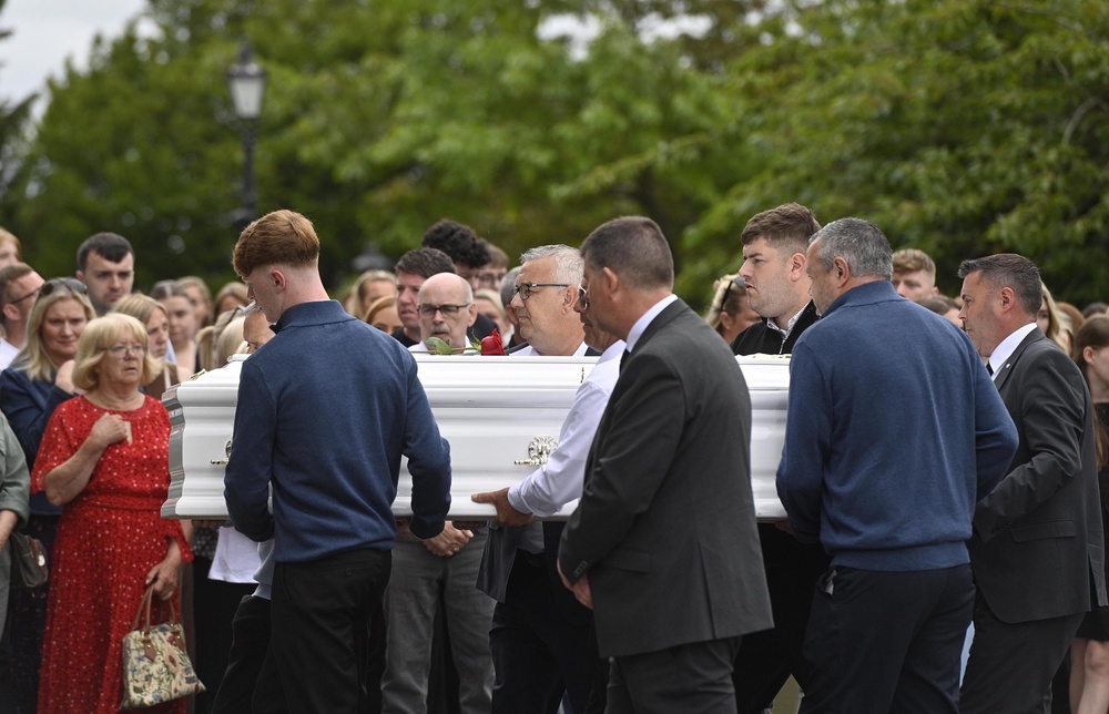 The coffin of Michaela Newcombe is carried into the Cathedral of Christ the King in Mullingar (Mark Marlow/PA) (PA Wire)