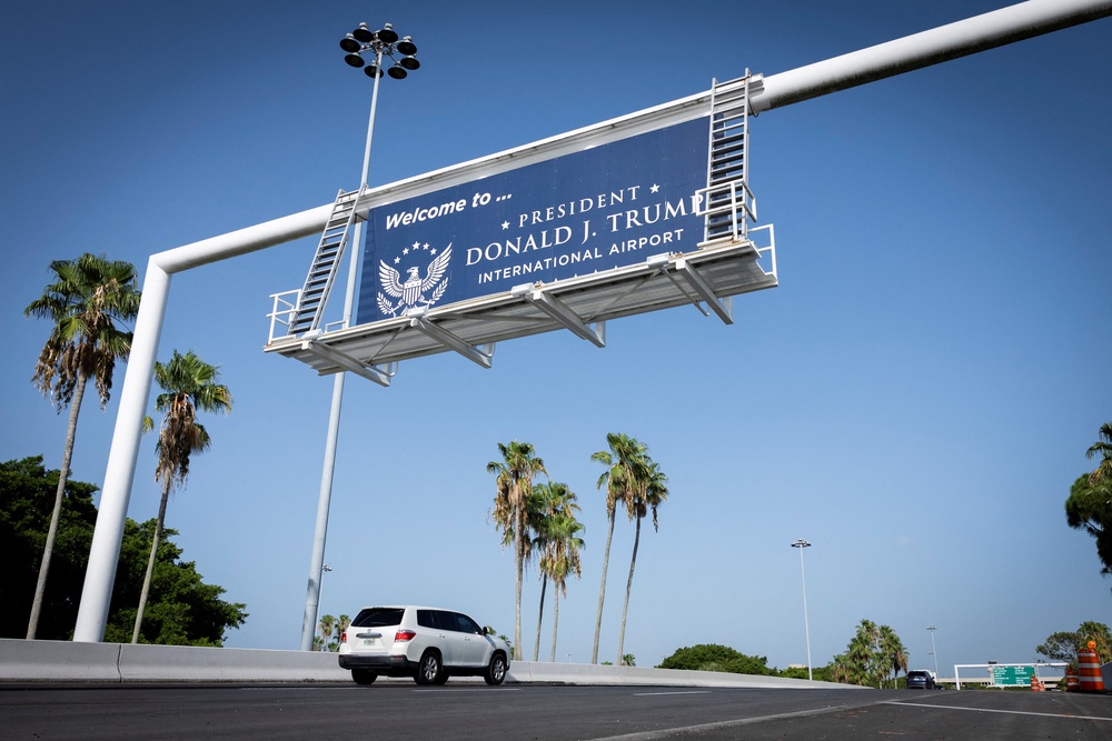 Signs welcoming people to the Florida airport have been updated to reflect the new name (Reuters)