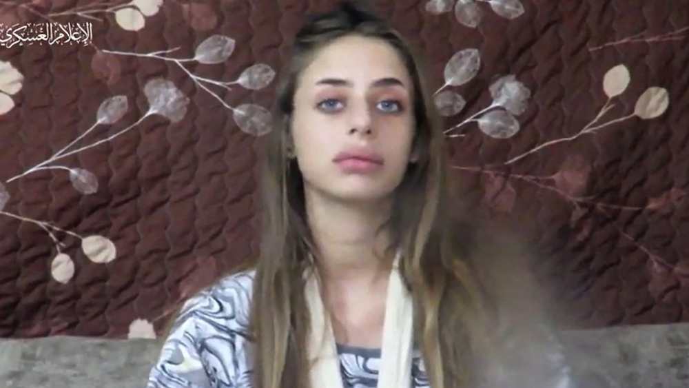 Mia Schem, 21, appears in a Hamas hostage video in the days following the 7 October attacks. (AFP/Hamas handout)