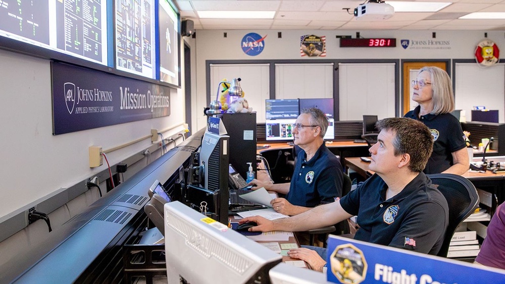 From left, flight controllers Mark Lahr and Josh Albers, and Mission Operations Manager Alice Bowman, monitor telemetry streaming from NASA's New Horizons spacecraft at the Johns Hopkins Applied Physics Laboratory in Maryland last month (NASA/Johns Hopkins APL/SwRI/Justin Gladden)