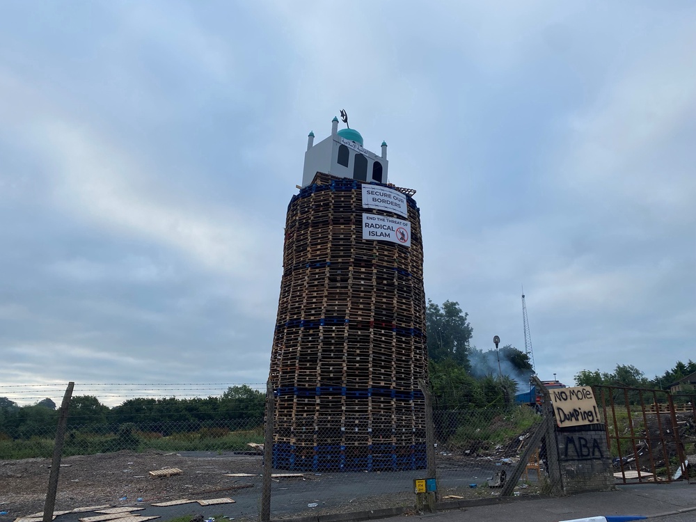 A replica mosque had been placed on top of the bonfire in Co Tyrone (Jonathan McCambridge/PA) (PA Wire)