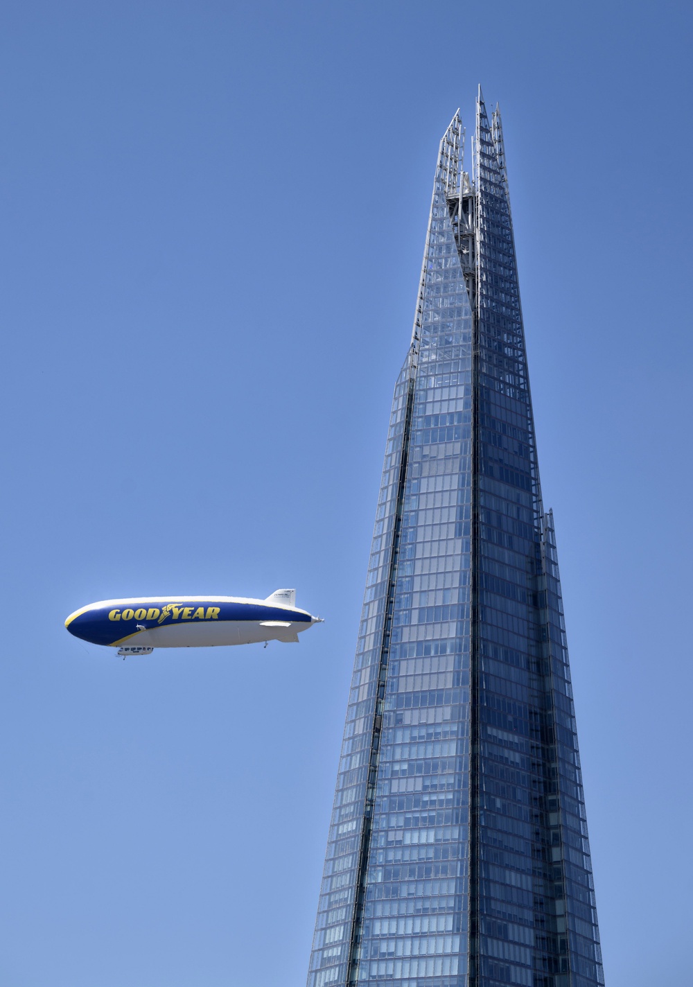 The Goodyear Blimp flying over The Shard in London. (PA)