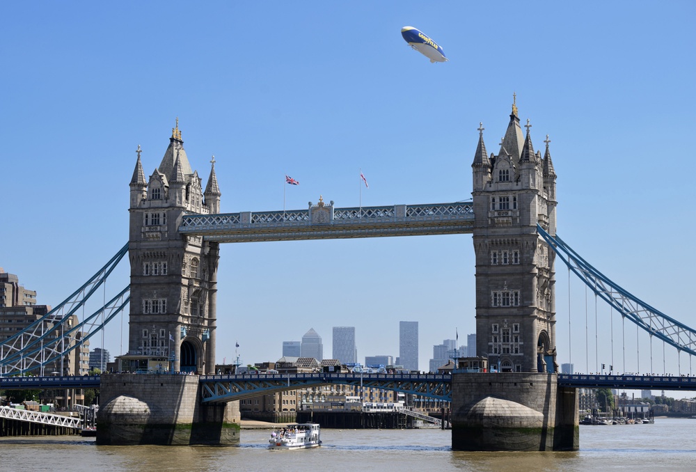 The Goodyear Blimp flying over Tower Bridge in London. (PA)