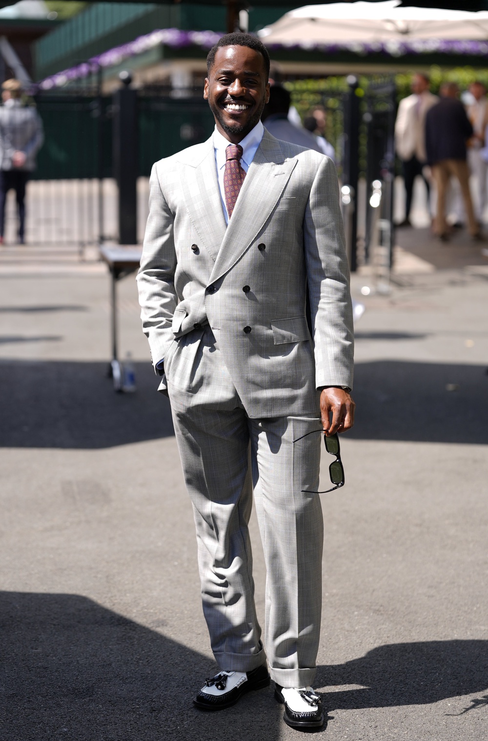 Ncuti Gatwa wore a gray suit and sunglasses