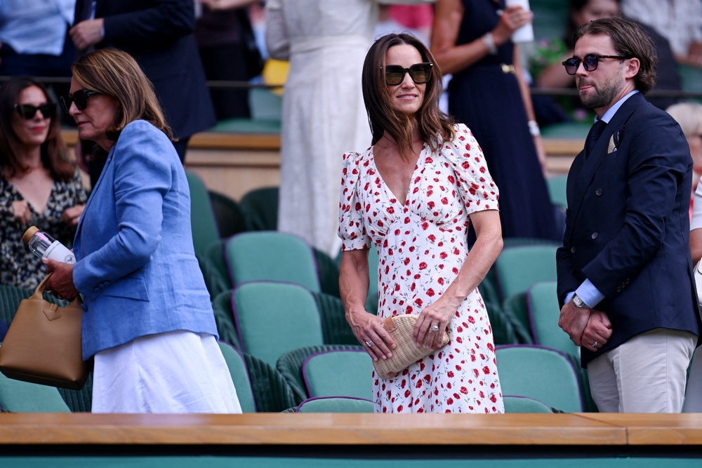 Pippa Middleton in the royal box with her mother Carole Middleton and Luca Rosso (Reuters)