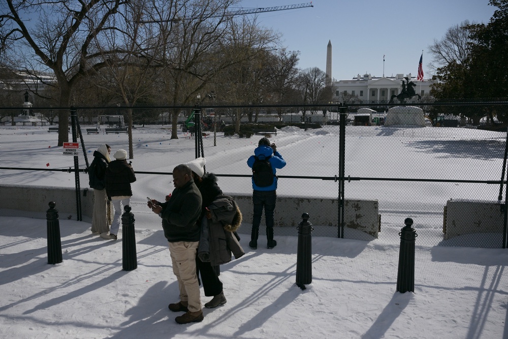 Additional fencing has been installed near the White House during time of heightened security. Fencing is seen in the snow in January 2026 (AFP via Getty Images)