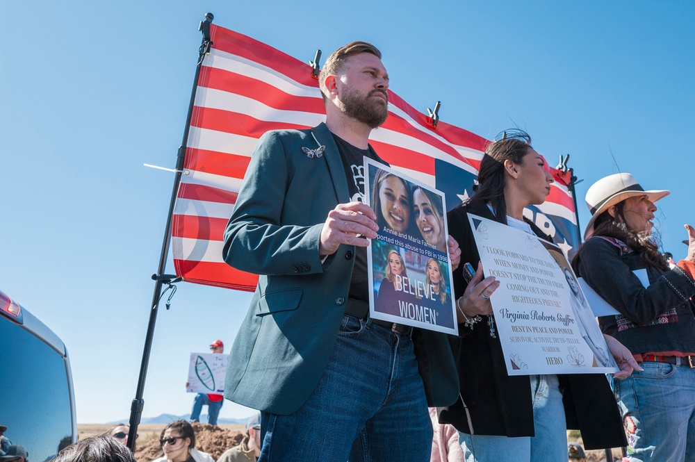 Virginia Giuffre’s brother Sky Roberts (left) and his wife Amanda Roberts joined protests demanding justice for his sister and other survivors of Epstein’s abuse near Zorro Ranch (Getty)