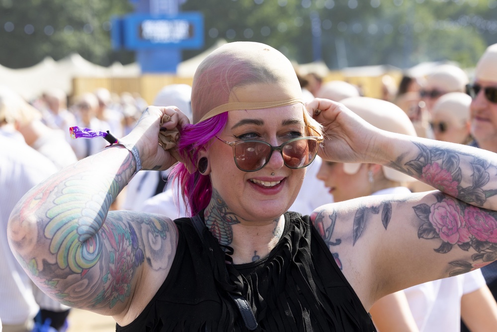 People take part in a Guinness World Records attempt for the largest gathering of people wearing bald caps ahead of Pitbull’s headlining show at BST Hyde Park (Dave Parry/PA) (PA Wire)
