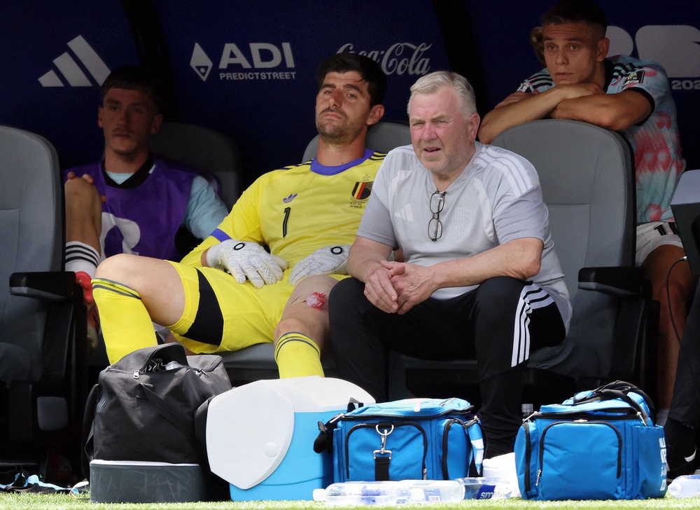 Thibaut Courtois was forced off with injury against Spain (Reuters)