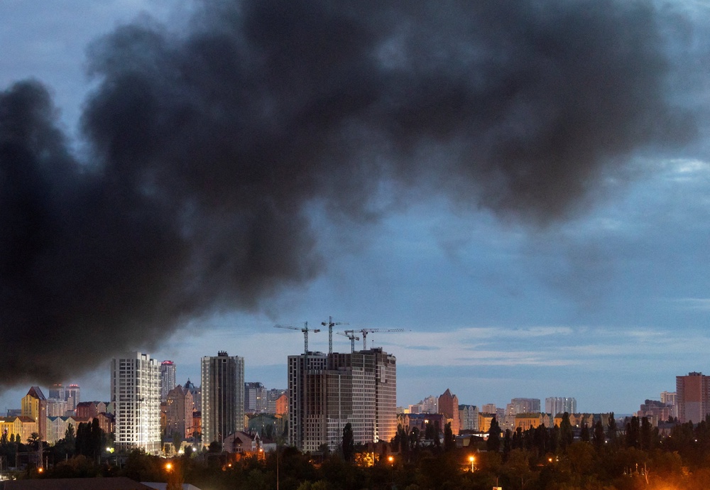 Eleven people were wounded in the capital, Kyiv, by an attack that used ballistic and cruise missiles as well as drones (Reuters)