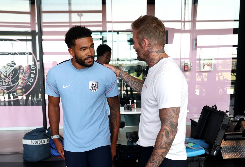 Former England player Sir David Beckham, speaks to Reece James (Getty)