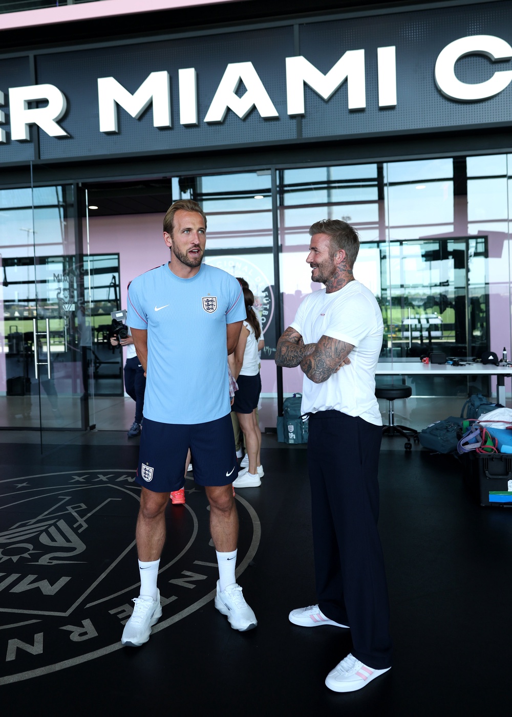 Former England player Sir David Beckham, speaks to Harry Kane (Getty)