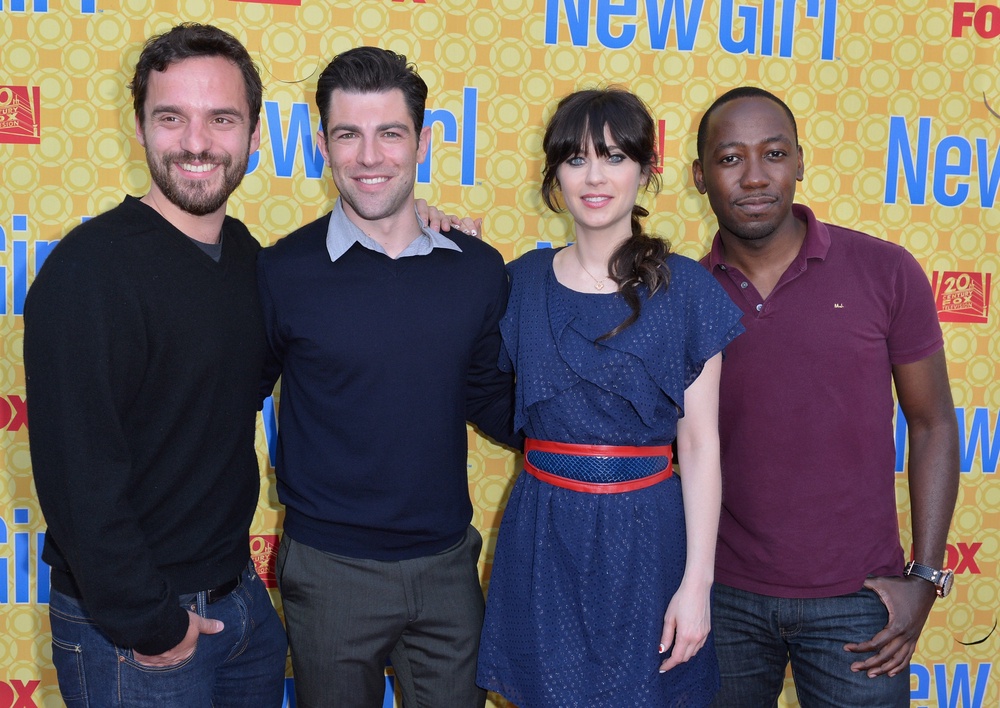 Zooey Deschanel with co-stars L-R Jake Johnson, Max Greenfield and Lamorne Morris (Getty)