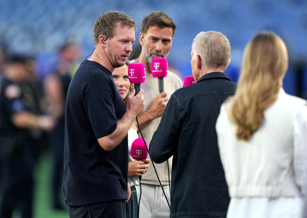 Julian Nagelsmann, left, seen during a television interview alongside Jurgen Klopp, left his role on July 3 (Martin Rickett/PA)