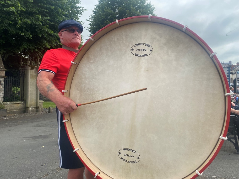 A man taking part in a Lambeg drumming display in Royal Hillsborough on Saturday (Jonathan McCambridge/PA)