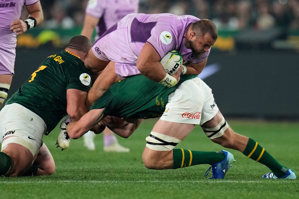 Pierre Schoeman is tackled by Springboks captain Pieter-Steph du Toit (Themba Hadebe/AP) (AP)