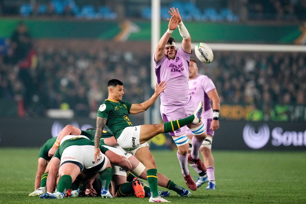 Embrose Papier, centre, scored the opening try for the Springboks (Themba Hadebe/AP) (AP)