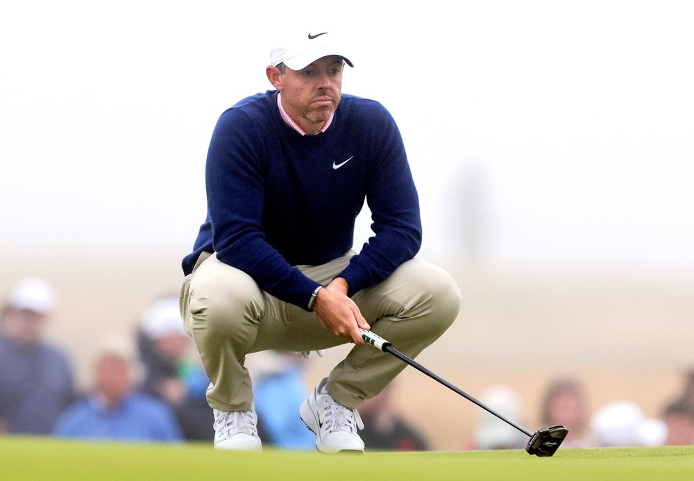Rory McIlroy did not tee off until 6pm (PA)