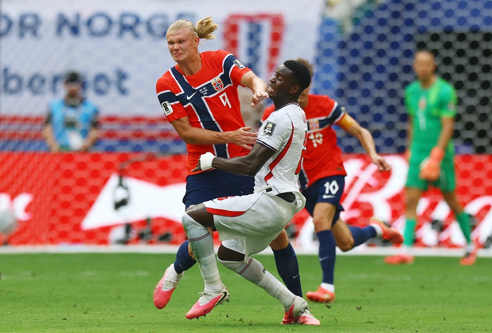 Guehi and Stones had their hands full from kick-off as Erling Haaland threatened (Reuters)