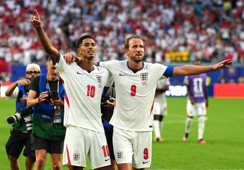 England’s Jude Bellingham and Harry Kane salute the fans (Martin Rickett/PA) (PA Wire)