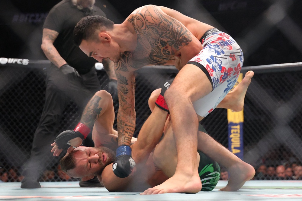 McGregor dropped to the canvas twice before calling off his fight (Reuters)