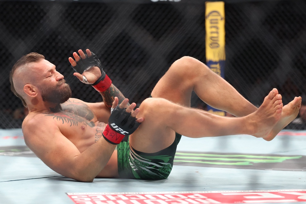 McGregor sustained an injury to his knee and kept buckling under his own weight (Getty)