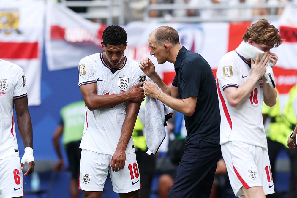 Bellingham takes instructions from his manager during the game (Getty)