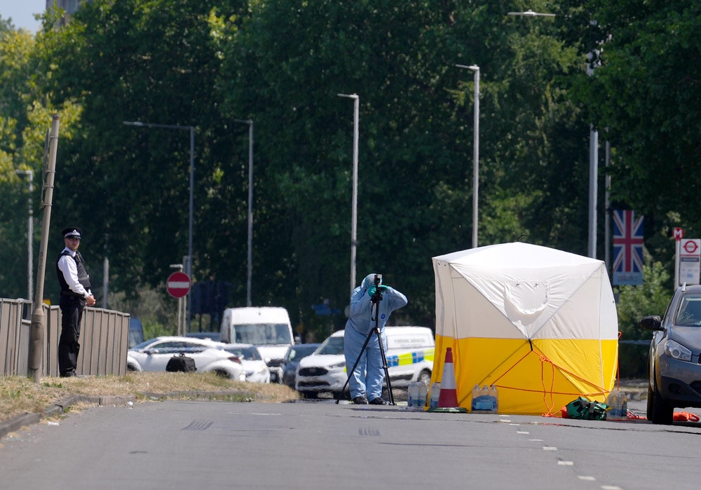 Officers found the woman with stab injuries after being called to a property on Uxbridge Road, Hayes, on Sunday morning (PA)