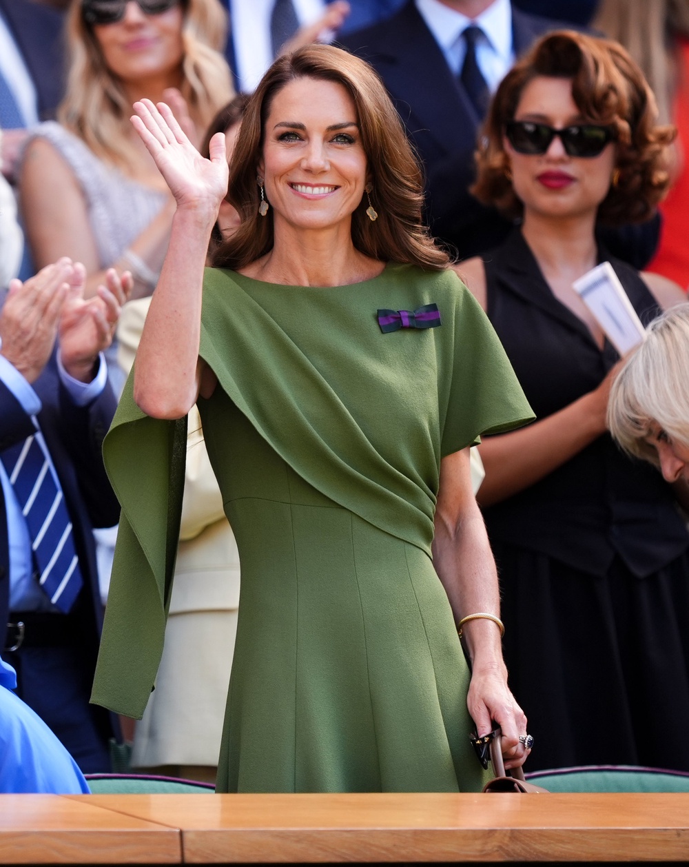 Kate waving as she takes her seat (Mike Egerton/PA) (PA Wire)