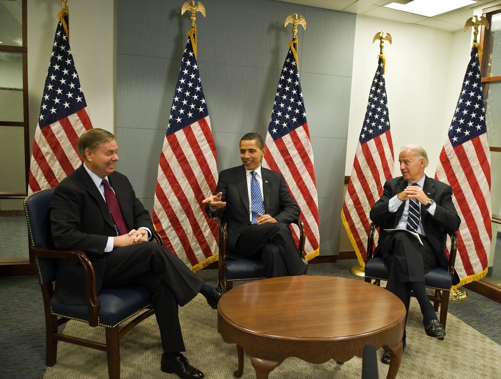 Graham (L) enjoyed a cordial relationship with his former colleagues and future presidents Barack Obama and Joe Biden. But Graham’s defense of Trump came at the expense of his friendship with Biden. (AFP/Getty)
